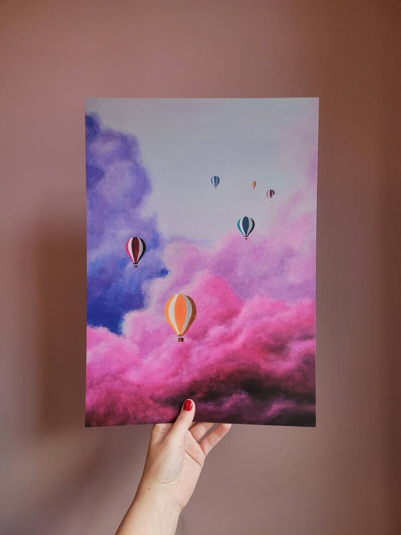 Een illustratie van kleurrijke luchtballonnen in de vorm van borsten op een A3 print.