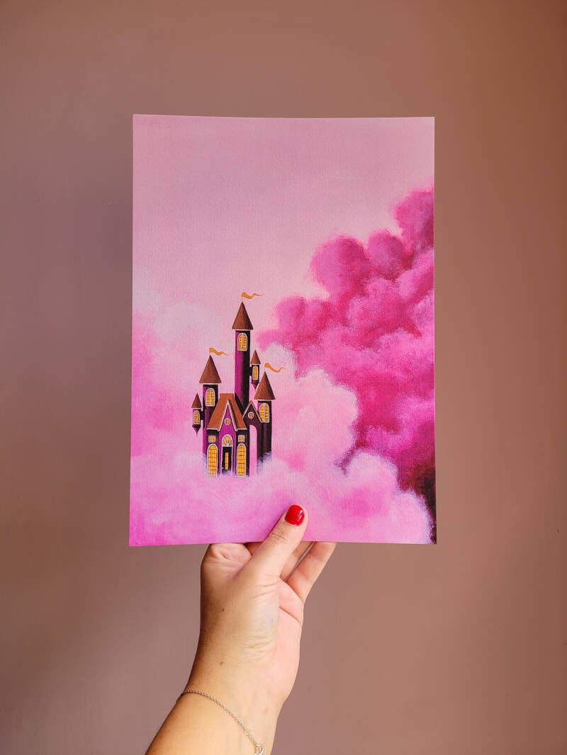 Een illustratie van een roze luchtkasteel omringd door vrolijke bloemen op een A4 print.