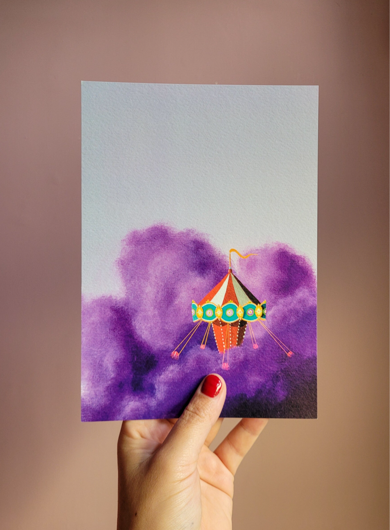 Een illustratie van een zweefmolen op een A5 print.