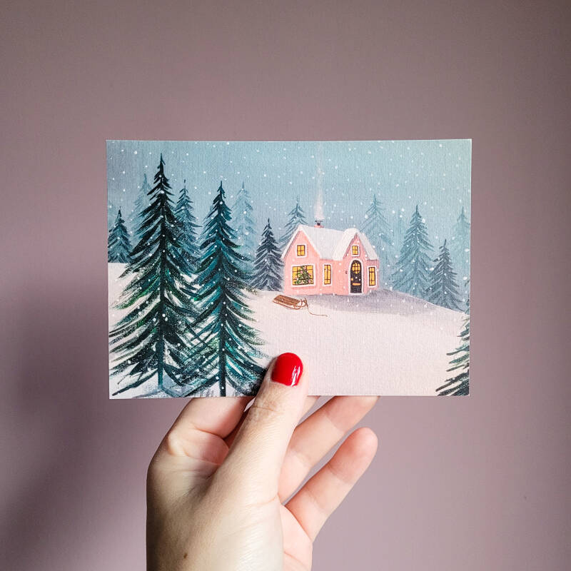 Een illustratie van een winter wonderland op een A6 ansichtkaart.