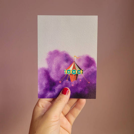 Een illustratie van een zweefmolen op een A6 ansichtkaart.