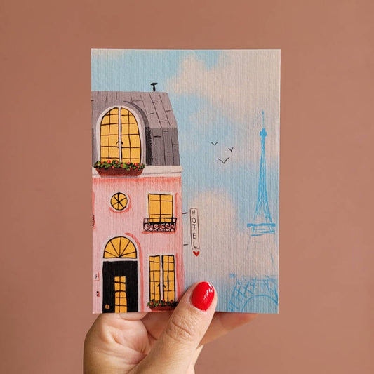 Een illustratie van een hotel in Parijs op een A6 ansichtkaart.