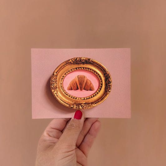 Kaart croissant in gouden lijstje